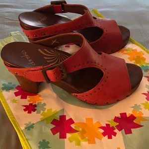 High-heeled (3.5”) slide sandals by Dansko